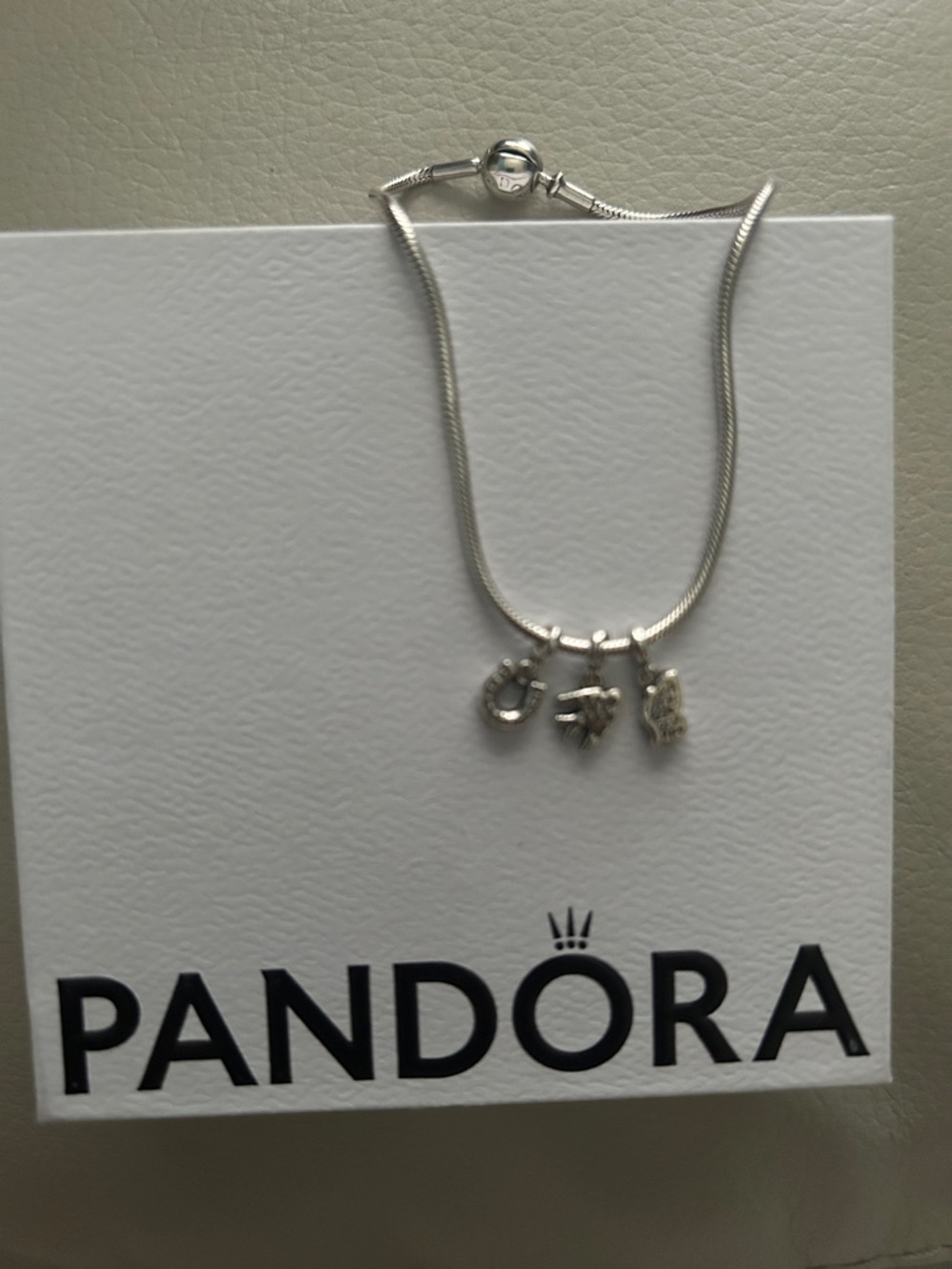 Pandora Sterling Silver Bracelet with three sterling silver charms - Picture 3 of 5